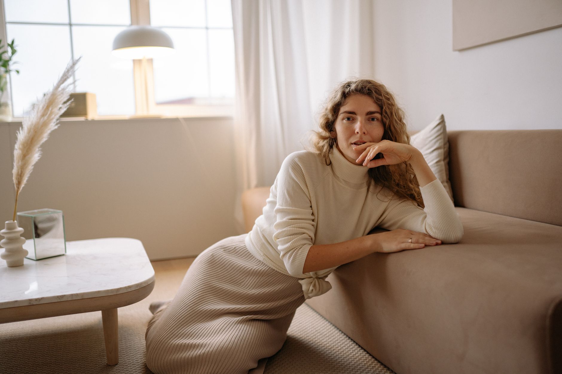 Relaxing at home in a calm, light-filled living room